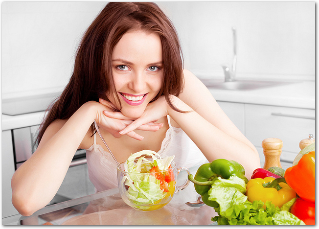 woman eating salad