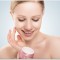 skin care.  beauty  girl with eyes closed with jar of cream